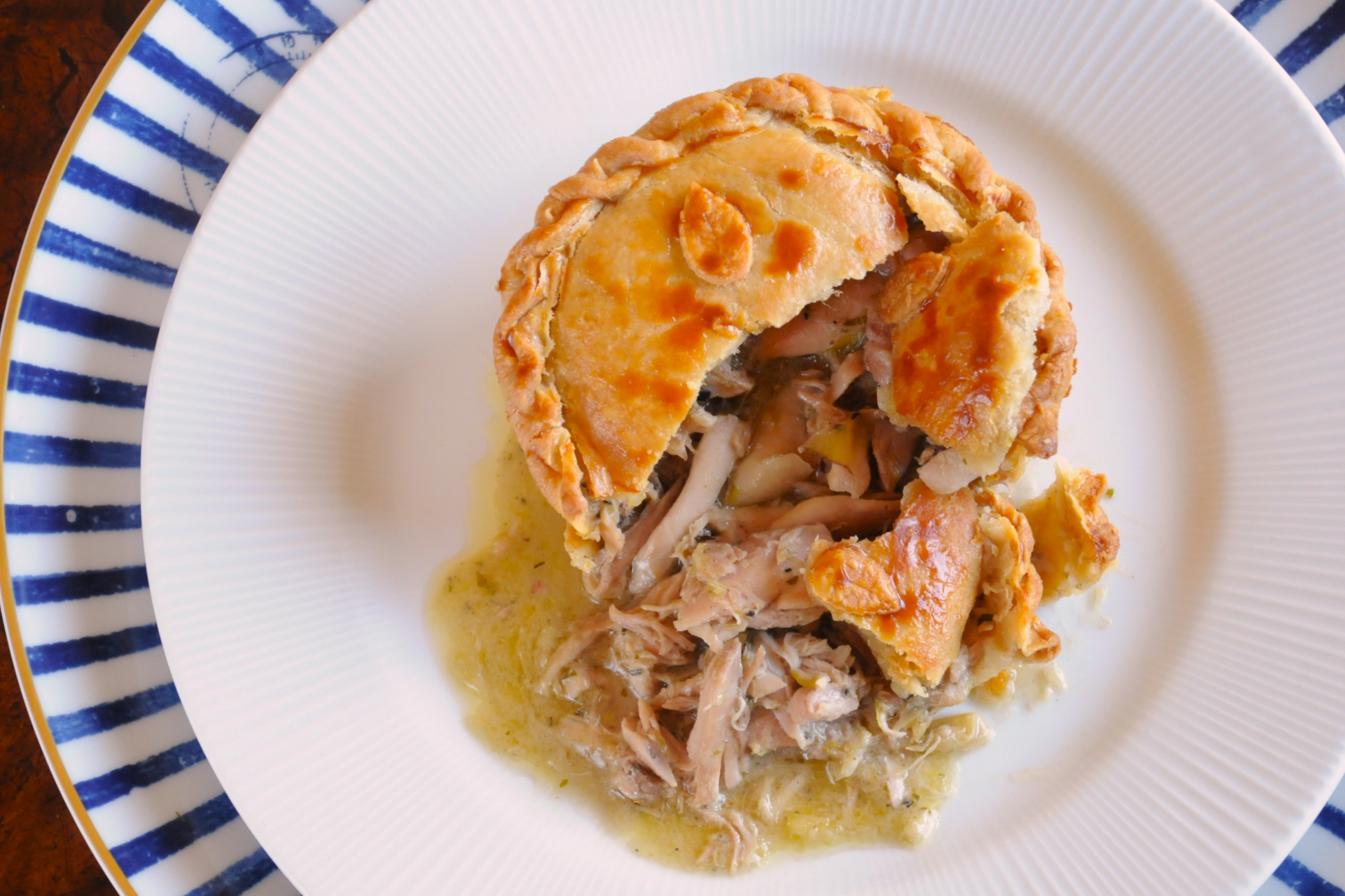 over head of 
Gourmet Chicken Baby Artichoke and Black Truffle Pie artisan meal by Chef George Tannock Algarve