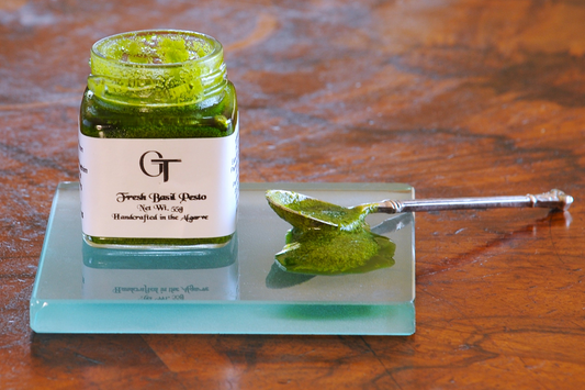 Open jar of fresh basil pesto by private chef George Tannock, handcrafted in the Algarve with Portuguese pine nuts