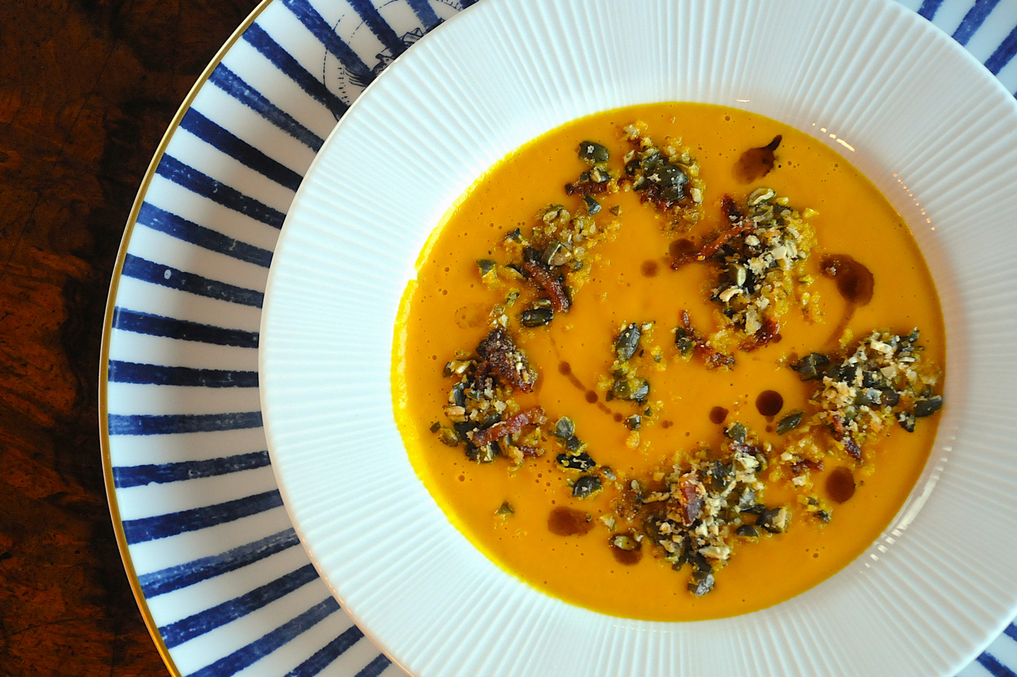 Pumpkin Soup with a Guanciale, White Truffle Oil & Pumpkin Seed Crumble
